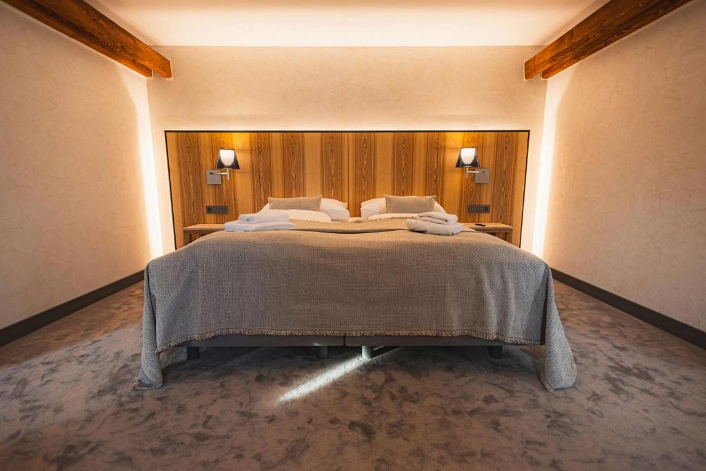 Postel nebo postele na pokoji v ubytování Hotel ALBRECHT