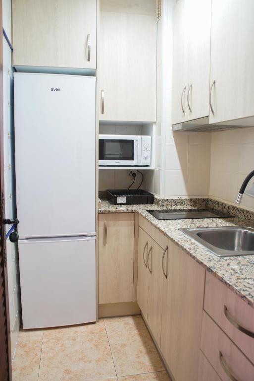 Kuchyň nebo kuchyňský kout v ubytování Playa Las Fuentes Bello LUXURY Apartament Pp2 PET
