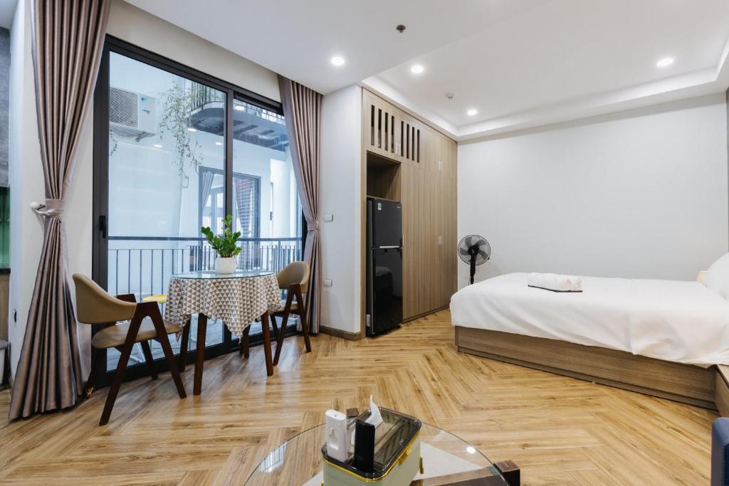 Postel nebo postele na pokoji v ubytování Westlake Emerald Suites