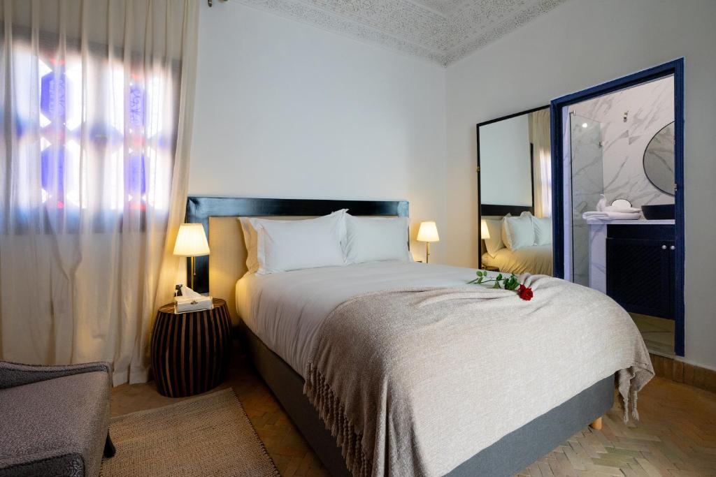 Postel nebo postele na pokoji v ubytování The Grand Riad and Spa