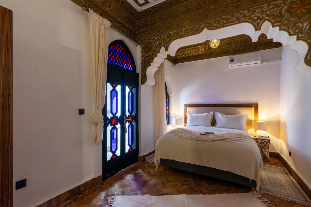 Postel nebo postele na pokoji v ubytování The Grand Riad and Spa