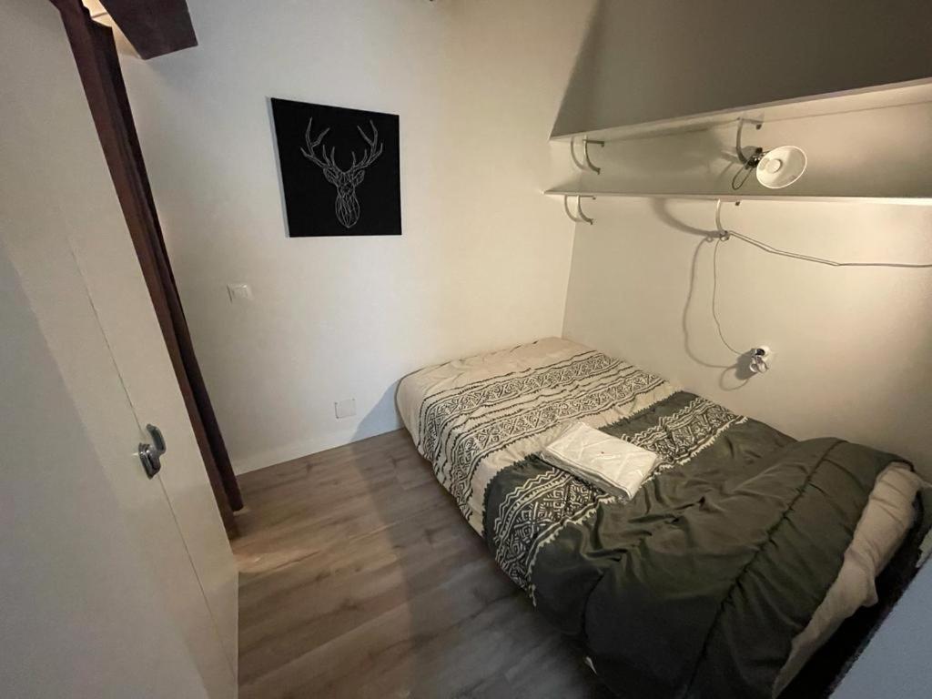 Postel nebo postele na pokoji v ubytování Immodelpas Mundial