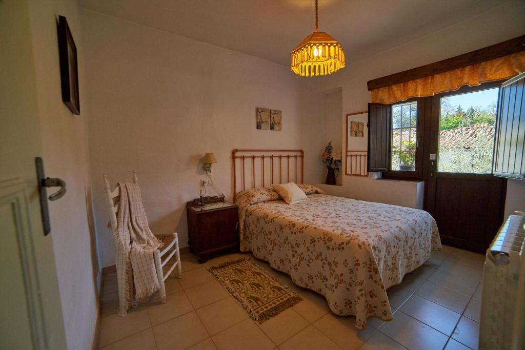 Postel nebo postele na pokoji v ubytování Tragaluz I