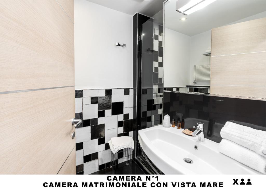 Koupelna v ubytování Affittacamere Lo Scoglio (Guesthouse)