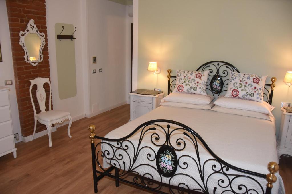 Postel nebo postele na pokoji v ubytování Guest House La Carolina