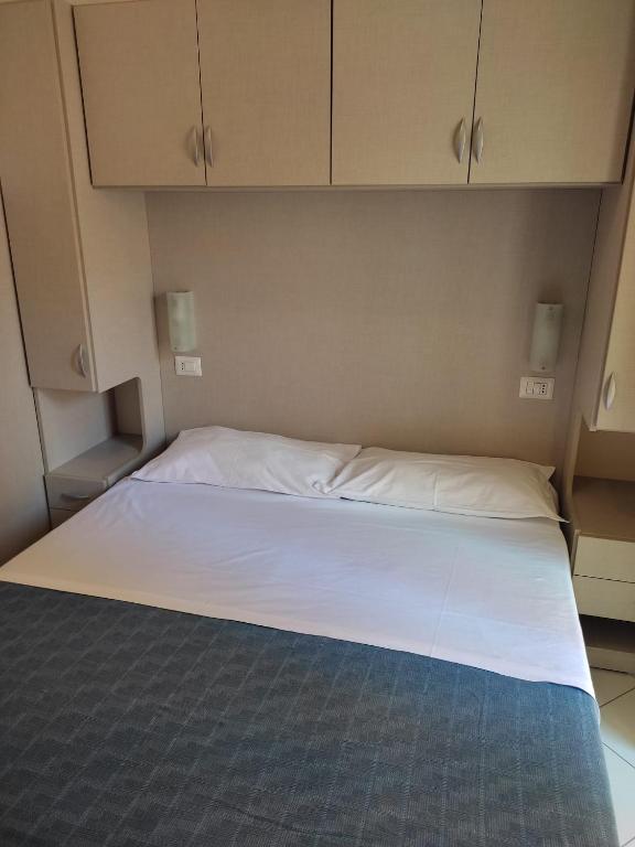 Postel nebo postele na pokoji v ubytování Hotel Sissi