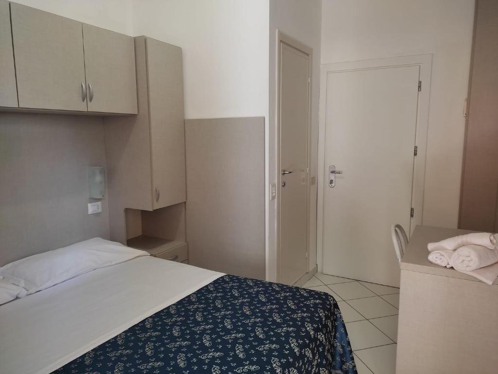 Postel nebo postele na pokoji v ubytování Hotel Sissi