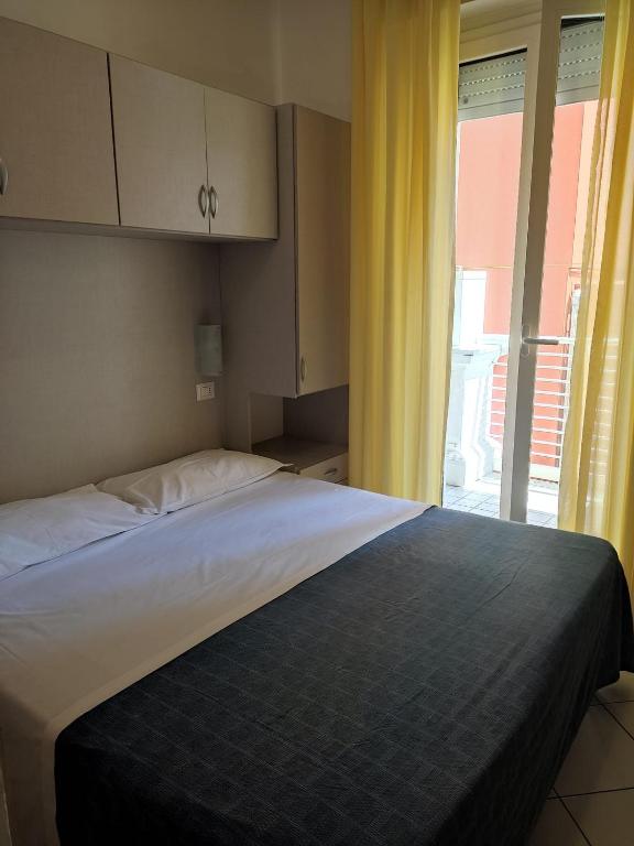 Postel nebo postele na pokoji v ubytování Hotel Sissi