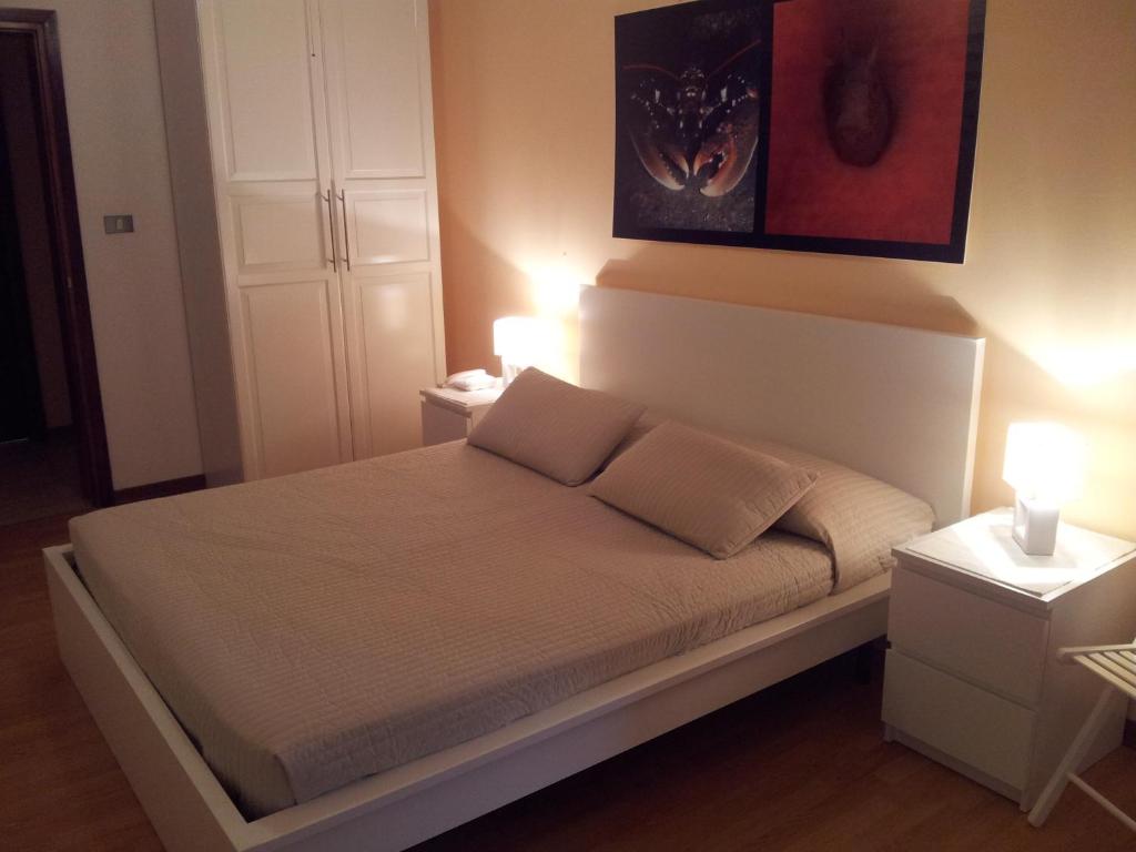 Postel nebo postele na pokoji v ubytování Hotel Moreri