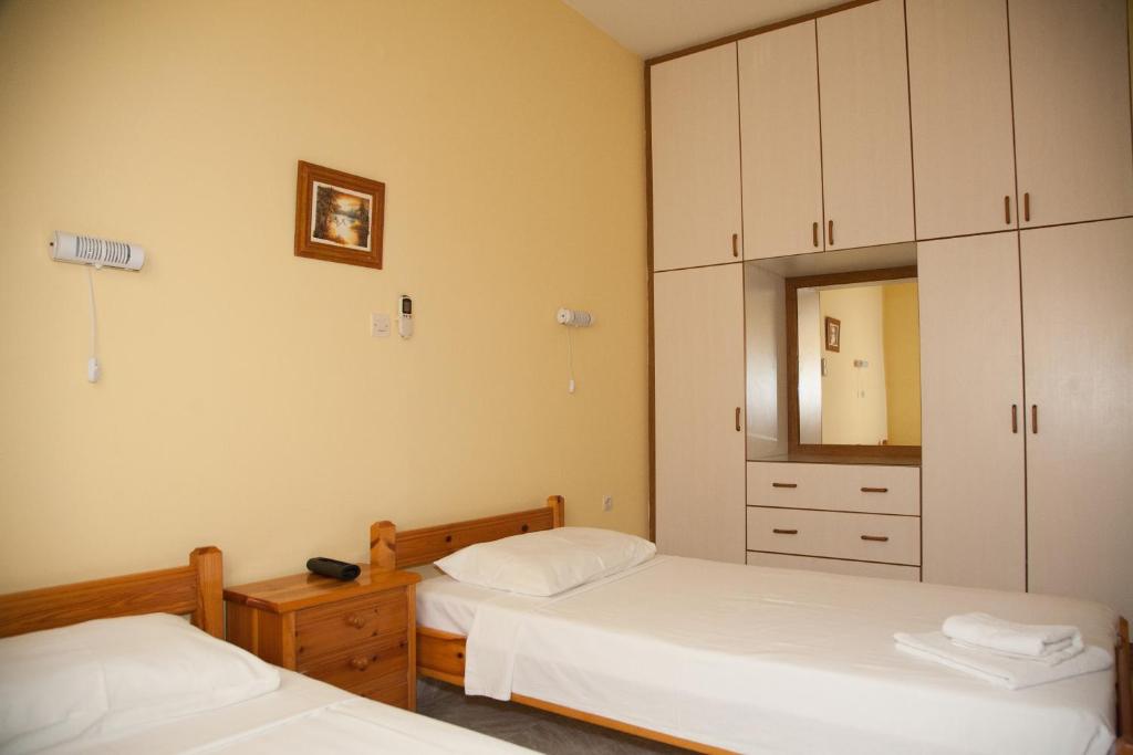 Postel nebo postele na pokoji v ubytování Stella Studios
