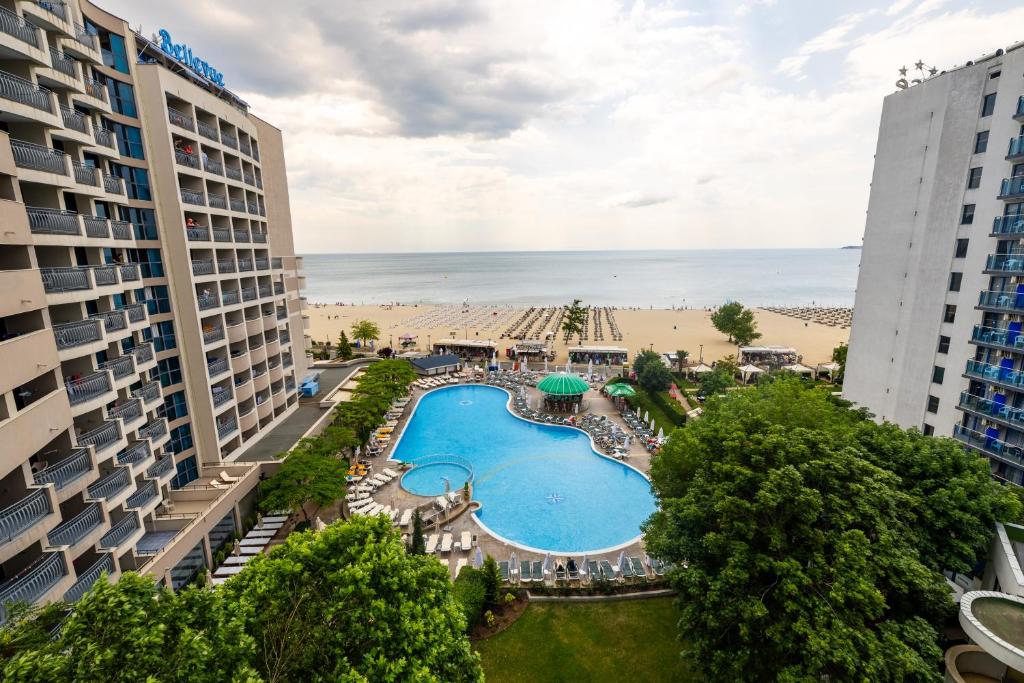an aerial view of a resort with a swimming pool and the beach at Hotel Slavyanski in Sunny Beach