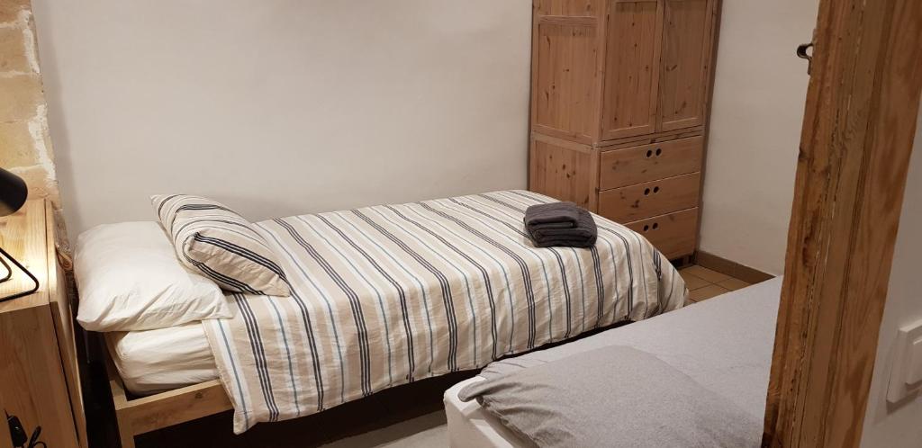 Postel nebo postele na pokoji v ubytování Cal Punet-Casa Bagà
