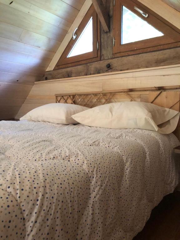 Tempat tidur dalam kamar di La chartrie