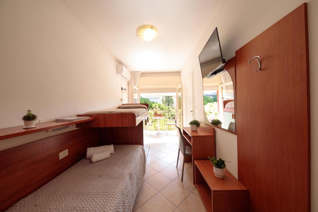 TV a/nebo společenská místnost v ubytování Hotel Madison