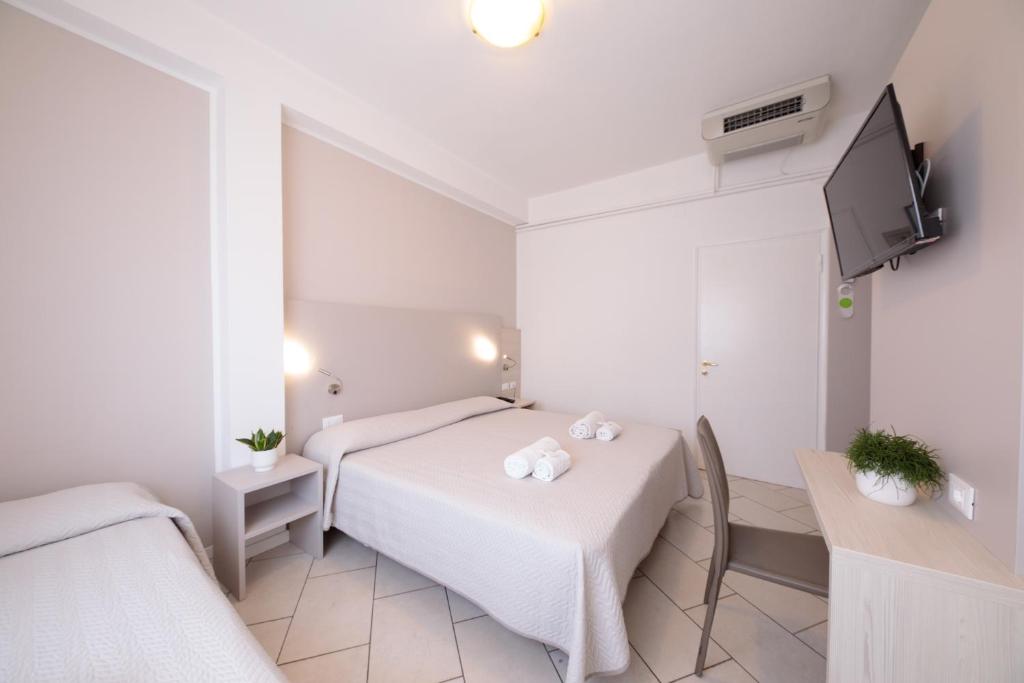 TV a/nebo společenská místnost v ubytování Hotel Madison