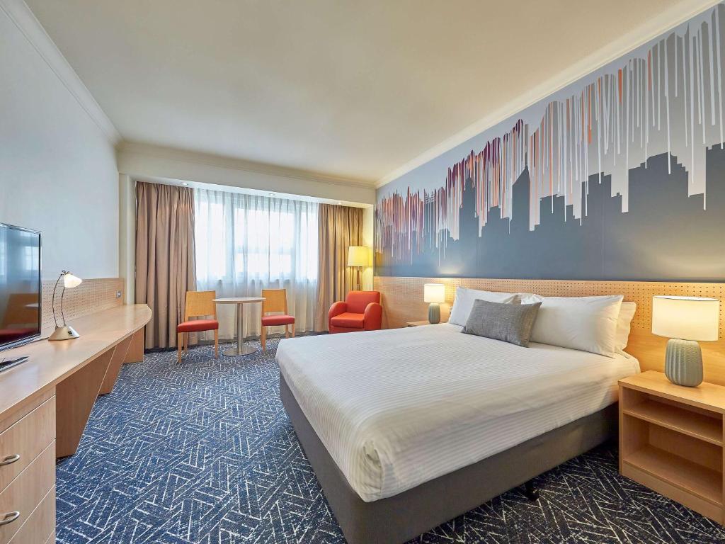 Postel nebo postele na pokoji v ubytování Mercure Perth