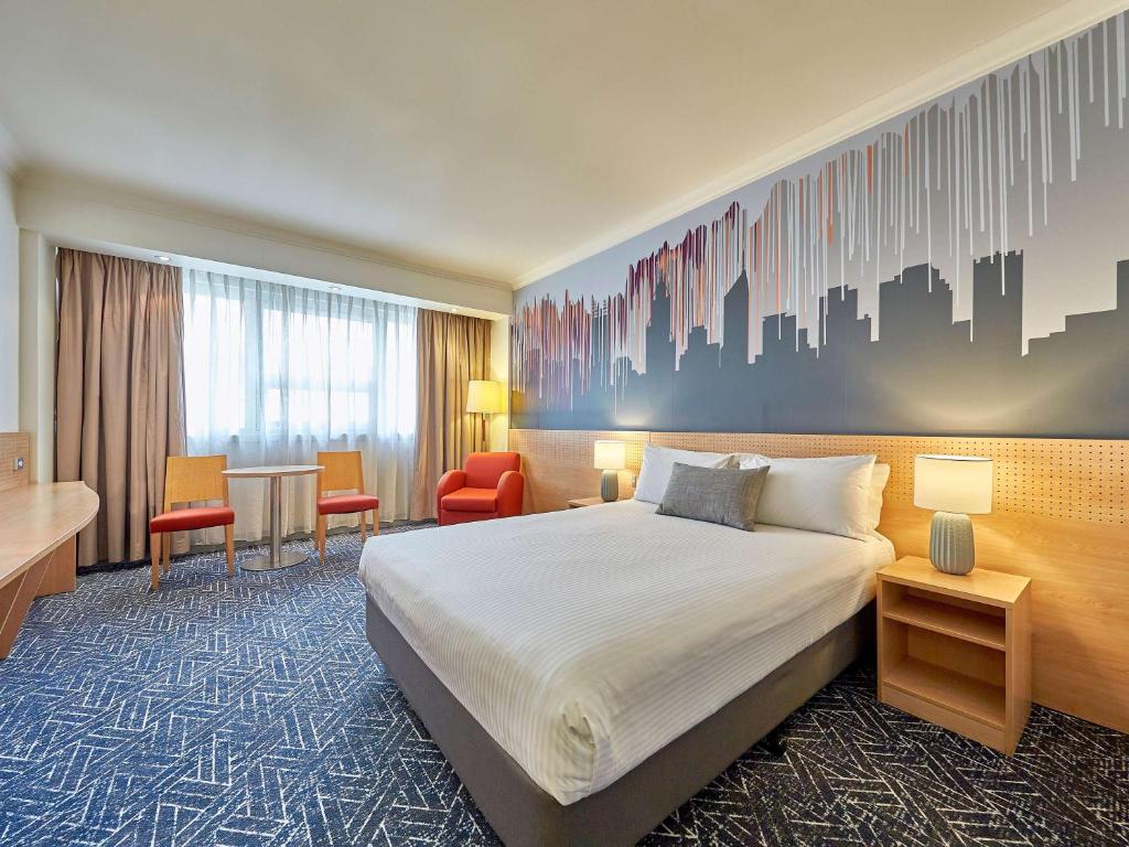 Postel nebo postele na pokoji v ubytování Mercure Perth
