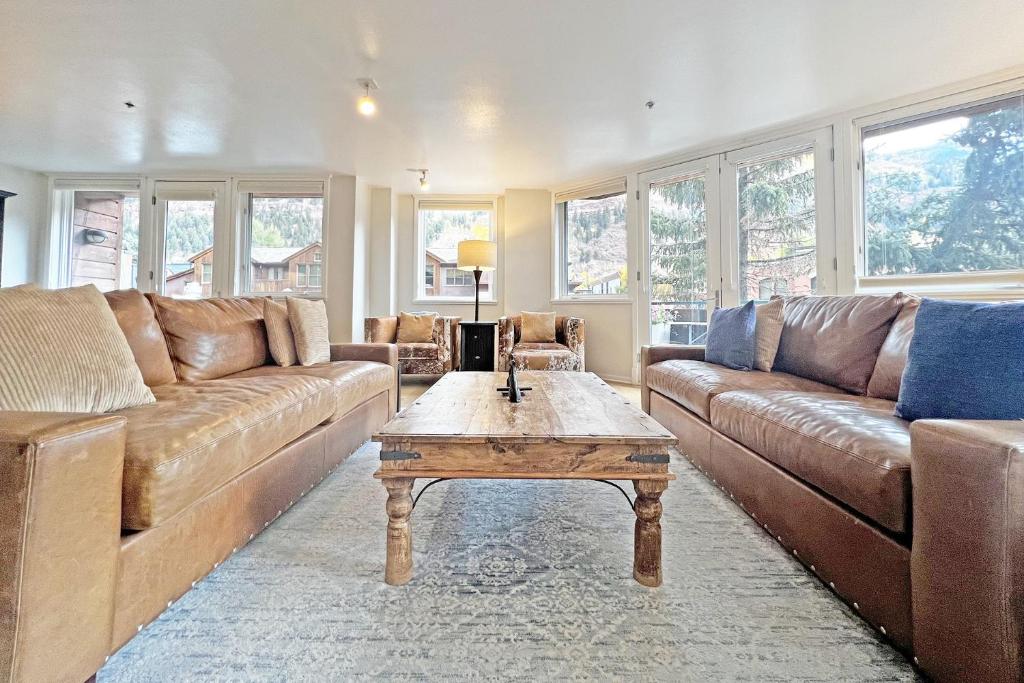a living room with a couch and a coffee table at Ice House 317 condo in Telluride