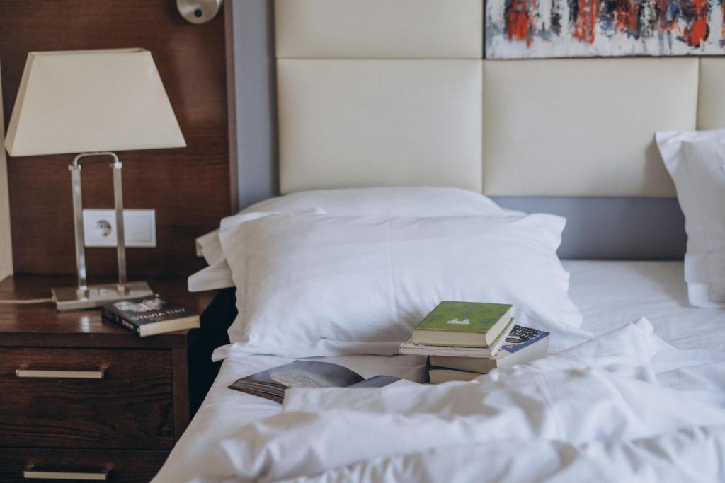 Postel nebo postele na pokoji v ubytování Costé Hotel