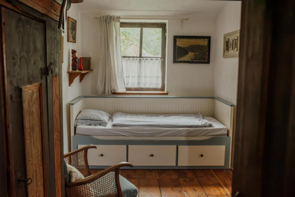 Postel nebo postele na pokoji v ubytování Statek Veberovi