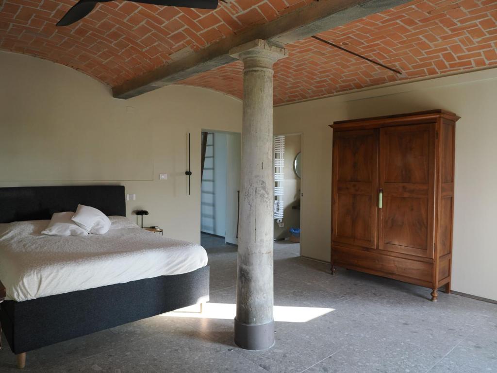 Postel nebo postele na pokoji v ubytování A chalet in the Italian countryside
