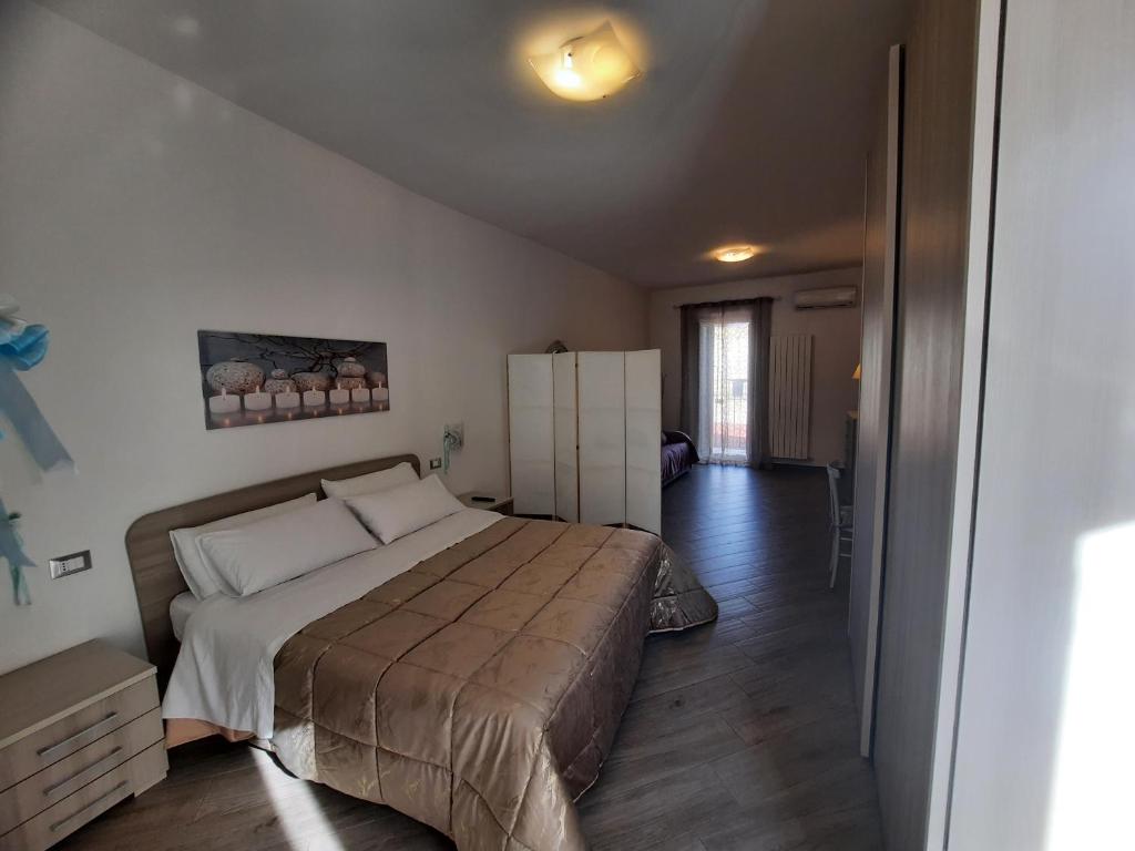 Postel nebo postele na pokoji v ubytování B&B Solimo