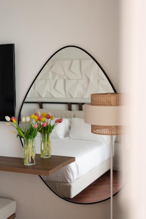 Postel nebo postele na pokoji v ubytování Hotel Delfino Taranto