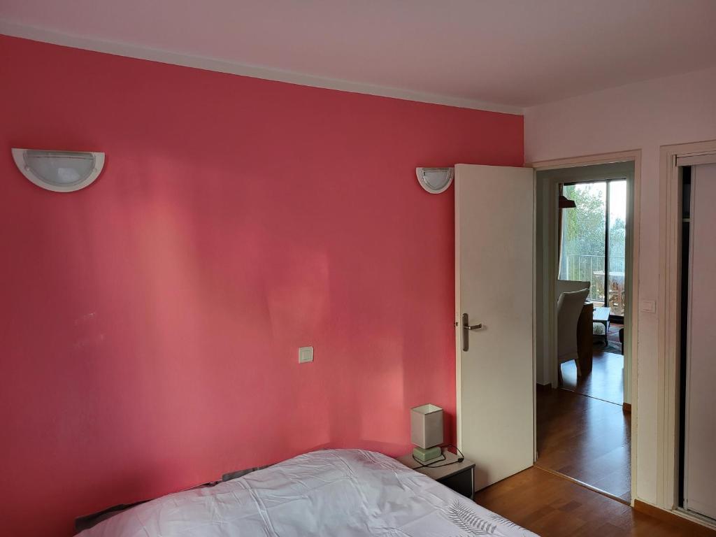 Postel nebo postele na pokoji v ubytování Appartement chaleureux vue panoramique