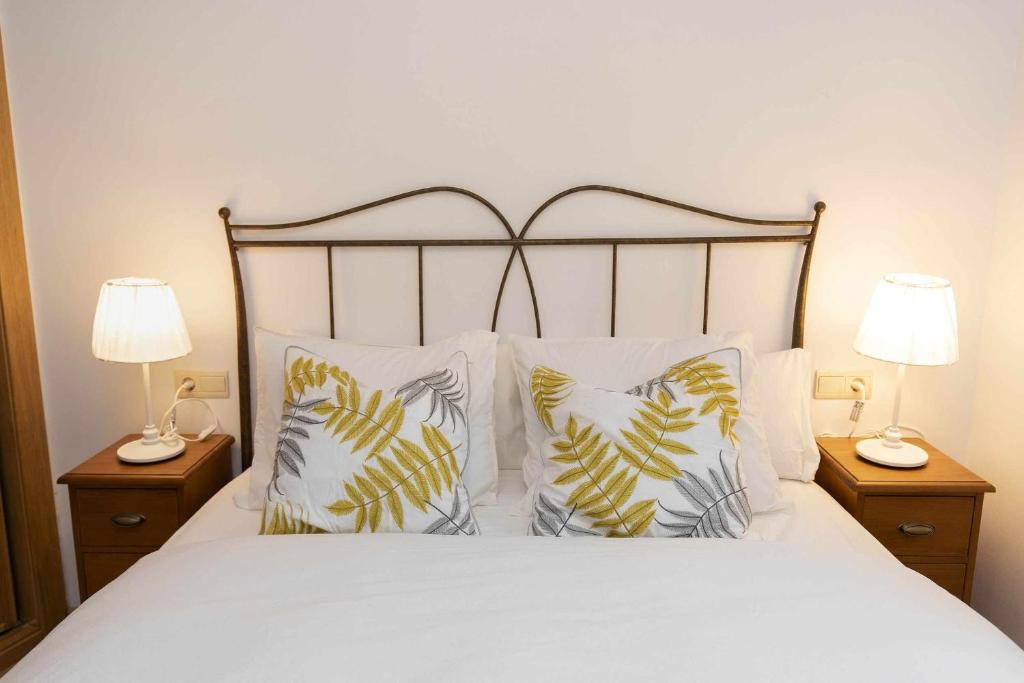 Ένα ή περισσότερα κρεβάτια σε δωμάτιο στο Rincón del Pueyo by BeValle