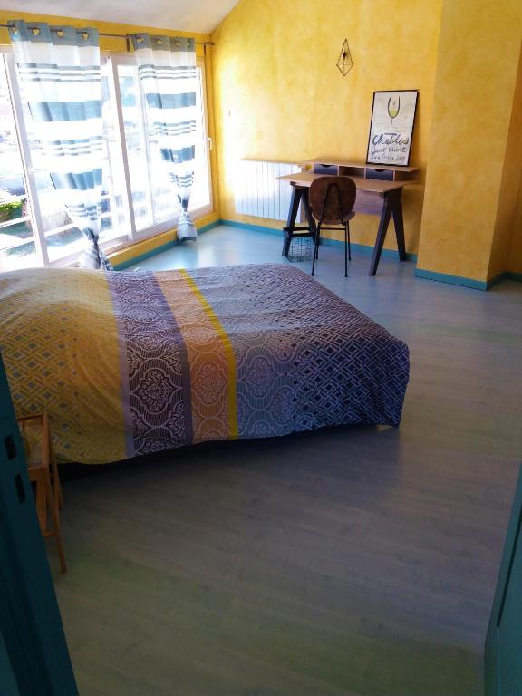 Postel nebo postele na pokoji v ubytování Gite Entre Pierre et Come
