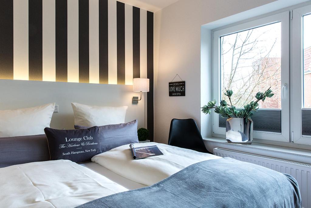 Ένα ή περισσότερα κρεβάτια σε δωμάτιο στο Riff5 Wohnung 3a