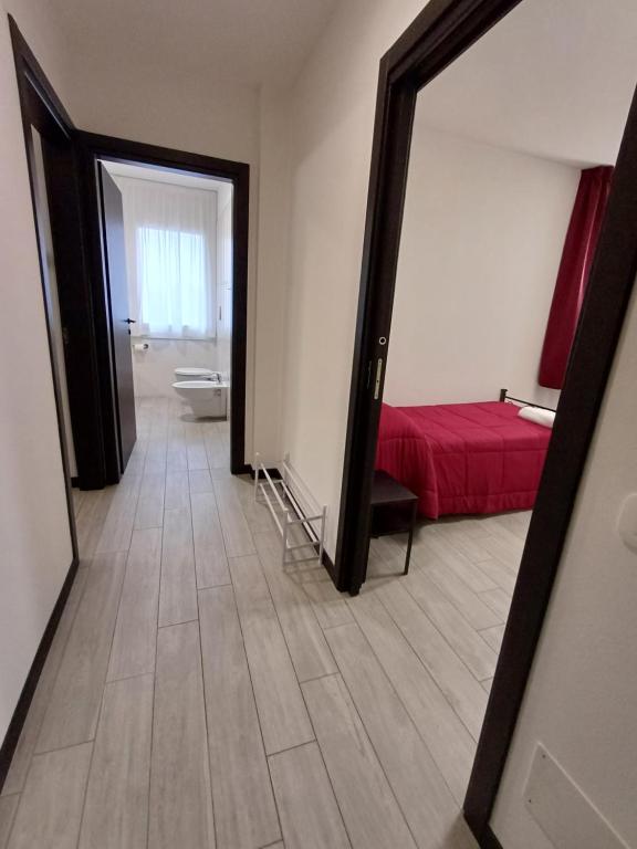 Postel nebo postele na pokoji v ubytování Arneroni