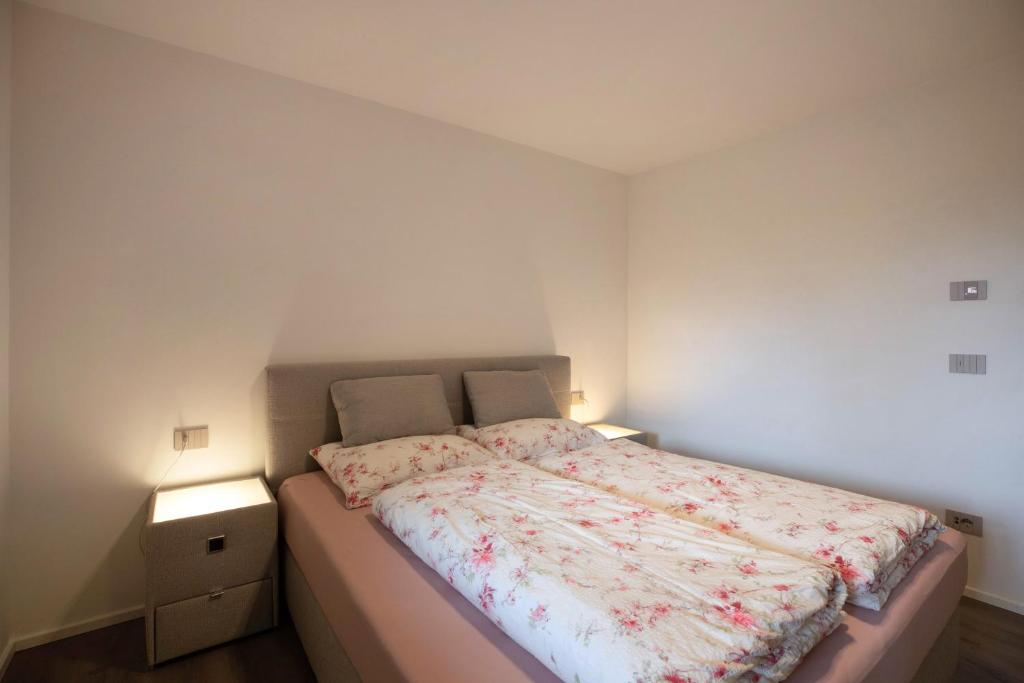 Postel nebo postele na pokoji v ubytování Appartement Obkircher