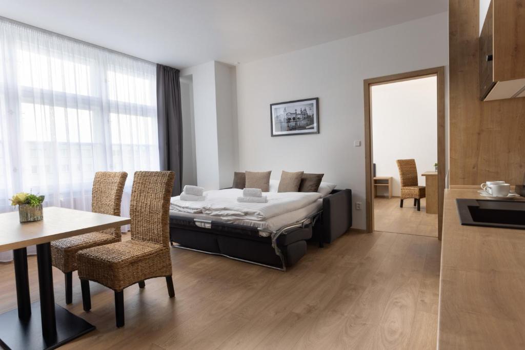 Postel nebo postele na pokoji v ubytování Residence Morris Mladá Boleslav