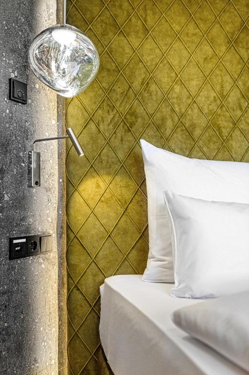 Postel nebo postele na pokoji v ubytování Alpines Lifestyle Hotel Tannenhof