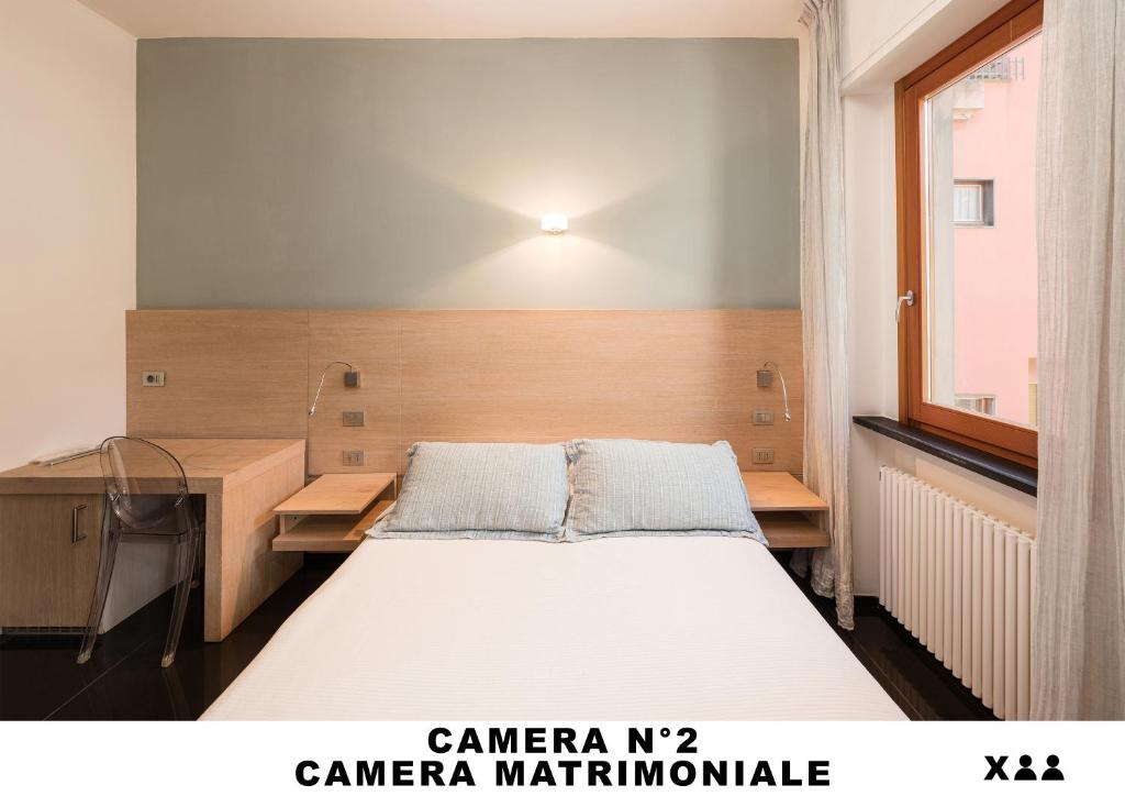 Postel nebo postele na pokoji v ubytování Affittacamere Lo Scoglio (Guesthouse)