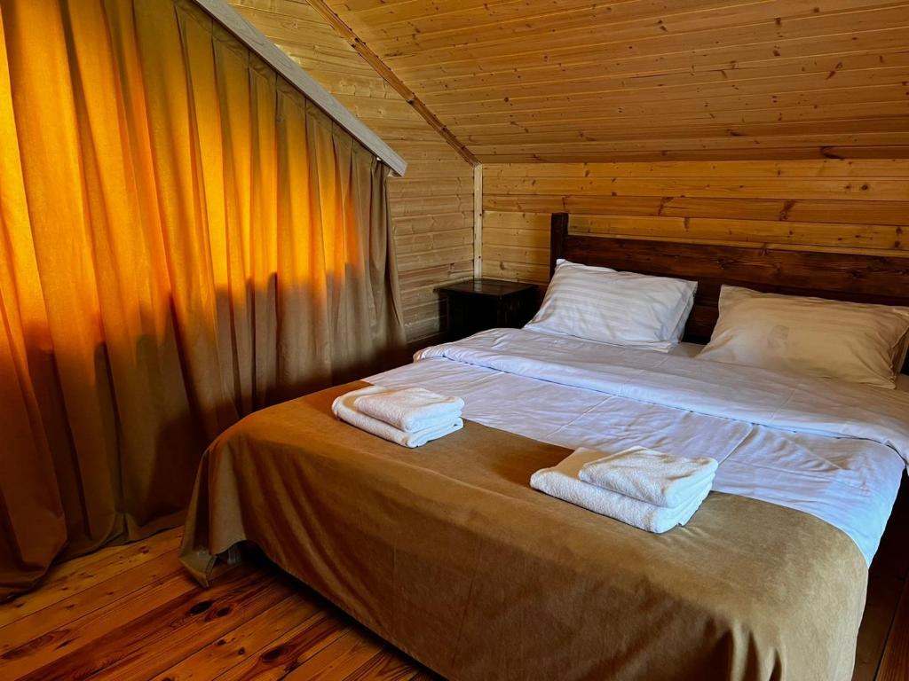 Postel nebo postele na pokoji v ubytování COTTAGE CHALET and TOURS
