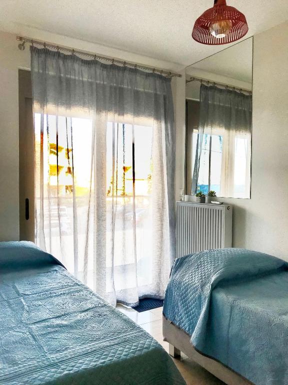 Posteľ alebo postele v izbe v ubytovaní Freedom Apartment Rethymno