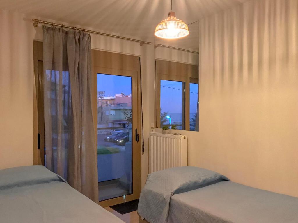 Posteľ alebo postele v izbe v ubytovaní Freedom Apartment Rethymno