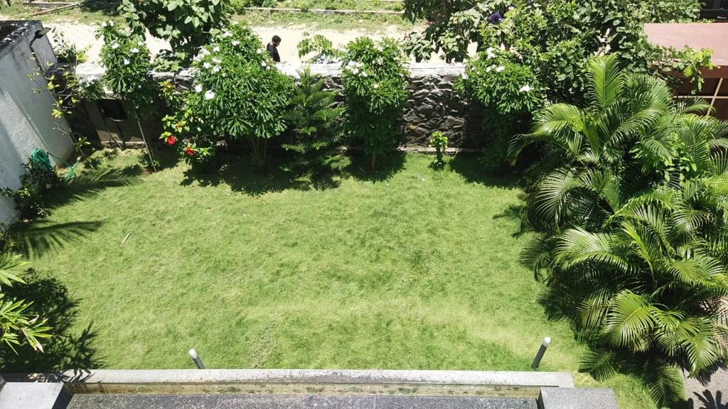 Zahrada ubytování Mer Vue Villa, Kovalam, ECR, Chennai