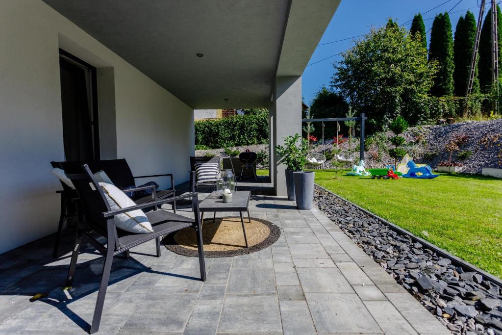 Vonkajšia záhrada v ubytovaní Nowoczesne Apartamenty typu Superior - Bulwary Rabka Zdrój - Balia - Blisko Park Zdrojowy