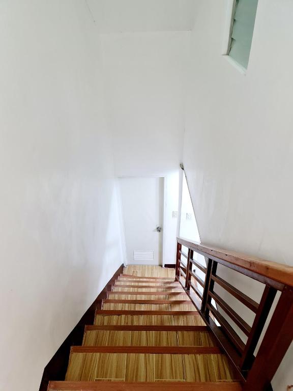 Postel nebo postele na pokoji v ubytování Calapan Transient House Acacia L37