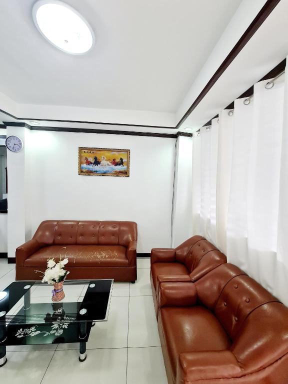 Posezení v ubytování Calapan Transient House Acacia L37