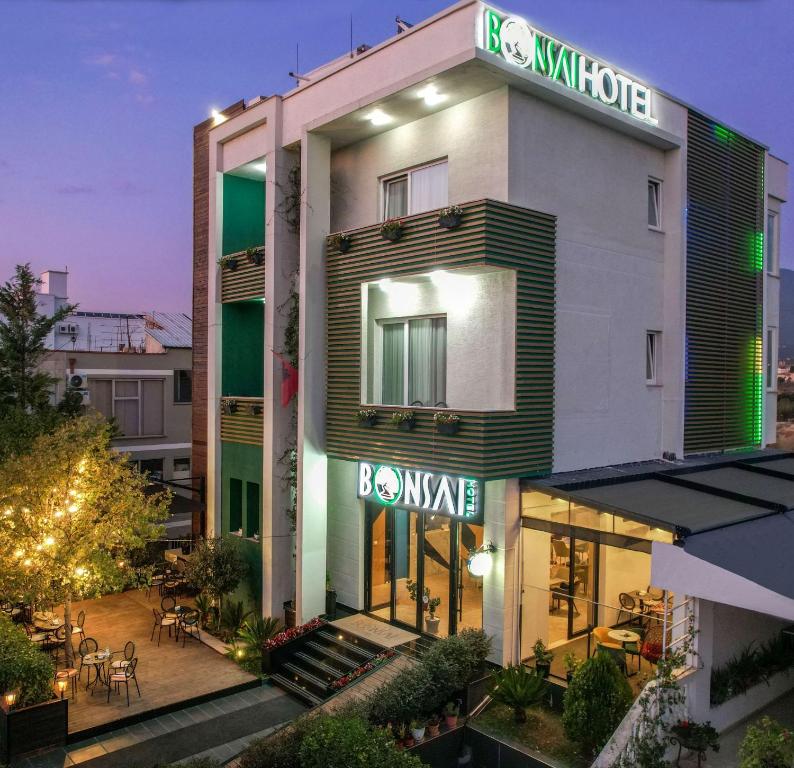 a building with a sign that reads bowingride at Hotel Bonsai in Tirana