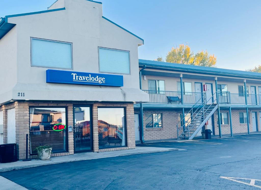 a building with a sign that reads traaples at Travelodge by Wyndham Wall in Wall