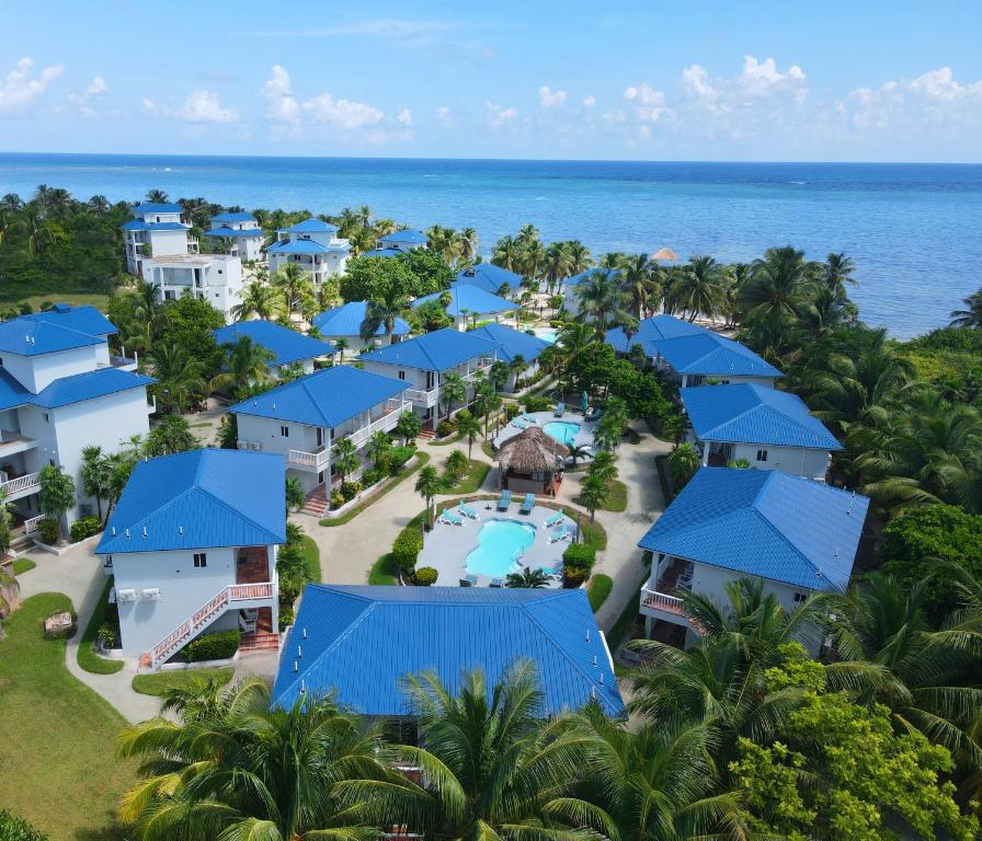 an aerial view of a resort with blue roofs at Sapphire Beach Resort in Basil Jones