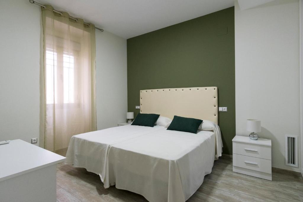 Postel nebo postele na pokoji v ubytování CASA CON PATIO