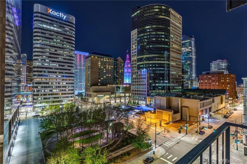 a city skyline at night with tall buildings at Larimer Square, Parking included, at The Windsor in Denver