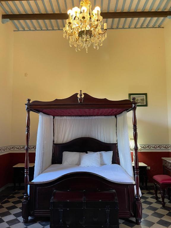 Postel nebo postele na pokoji v ubytování Hacienda Kaan Ac