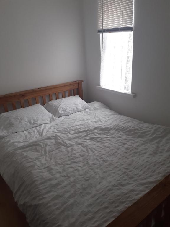En eller flere senge i et værelse på Heart of Deptford